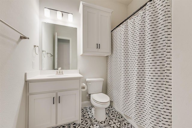 1302 Middleton Dr, Rockwall, TX 75087 - full bath with toilet, vanity, a shower with shower curtain, and tile patterned flooring