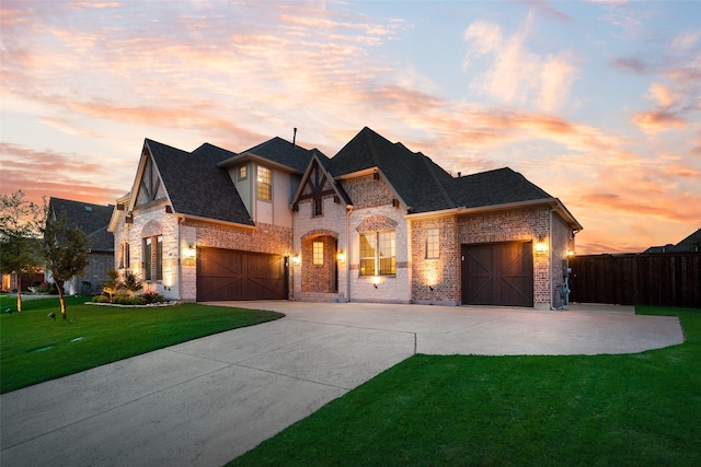 1302 Middleton Dr, Rockwall, TX 75087 - french provincial home featuring driveway, stone siding, brick siding, and a garage
