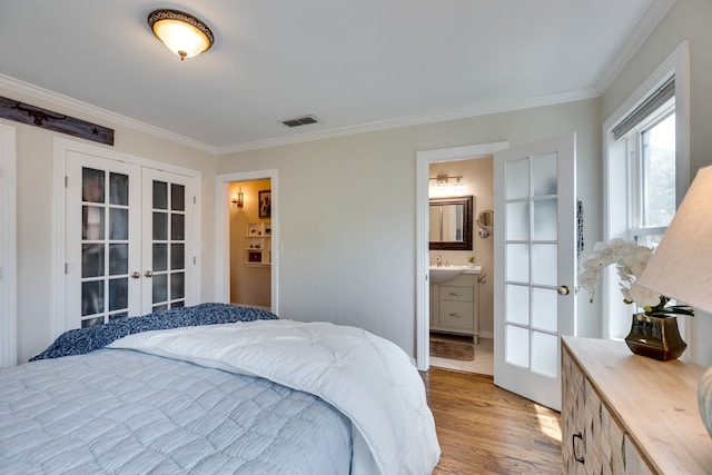 3817 Hilltop Rd, Fort Worth, TX 76109 - bedroom featuring french doors, light wood-style floors, crown molding, and ensuite bathroom
