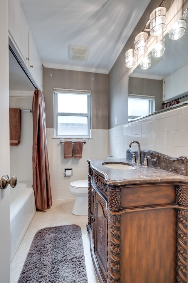 3817 Hilltop Rd, Fort Worth, TX 76109 - full bath featuring tile walls, vanity, toilet, tile patterned flooring, and ornamental molding