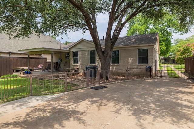 3817 Hilltop Rd, Fort Worth, TX 76109 - back of house with a patio and brick siding