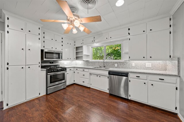 1403 E Texas Ave, Mart, TX 76664 - kitchen with appliances with stainless steel finishes, open shelves, a sink, a ceiling fan, and white cabinets