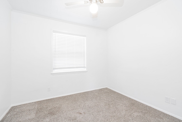 2401 Gilmer St, Caddo Mills, TX 75135 - unfurnished room with carpet flooring, ceiling fan, baseboards, and ornamental molding