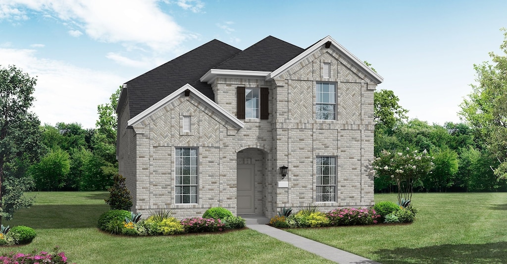 2833 Fargo Mews, Fate, TX 75087 - view of front of house with a front yard and stone siding
