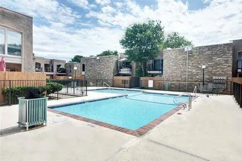 5502 Boca Raton Blvd Unit 329, Fort Worth, TX 76112 - community pool featuring a patio area