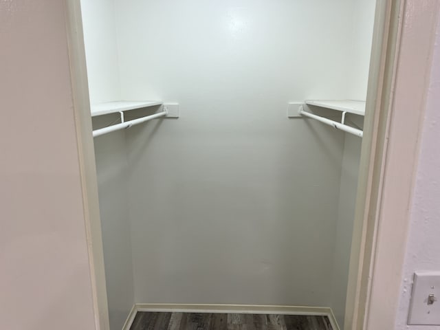 5502 Boca Raton Blvd Unit 329, Fort Worth, TX 76112 - walk in closet with dark wood-type flooring