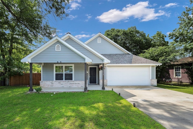 1004 San Jacinto St, Terrell, TX 75160 - ranch-style home featuring an attached garage, driveway, covered porch, and brick siding