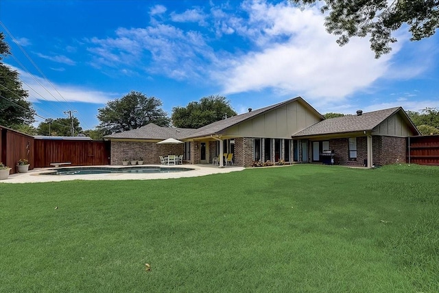 3108 Landershire Ln, Plano, TX 75023 - rear view of house featuring brick siding, board and batten siding, and a patio