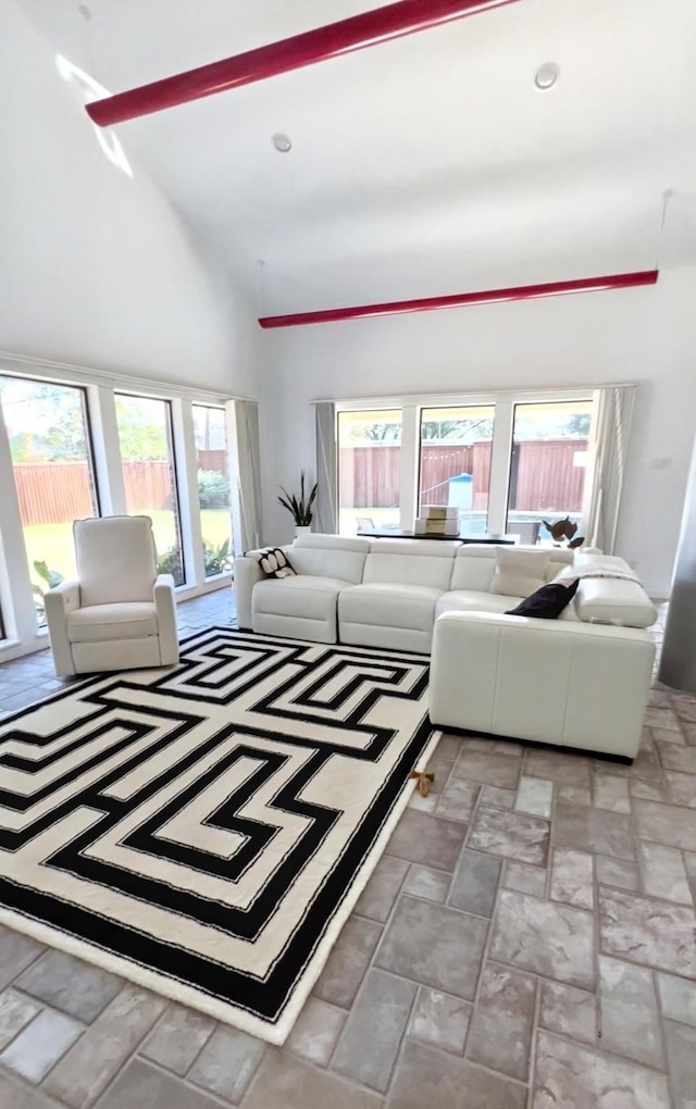 3108 Landershire Ln, Plano, TX 75023 - living area featuring healthy amount of natural light and high vaulted ceiling