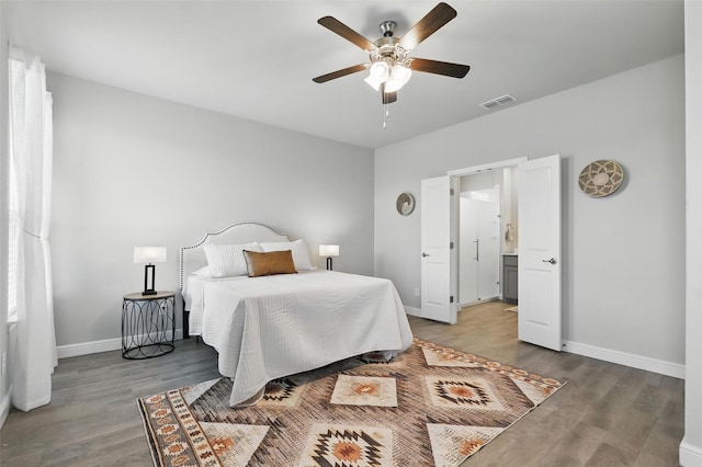 1708 Lapetus, Haslet, TX 76052 - bedroom with baseboards, wood finished floors, and ceiling fan