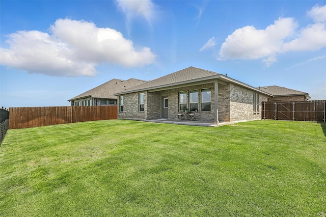 1708 Lapetus, Haslet, TX 76052 - back of house with brick siding, a patio, and a shingled roof