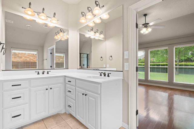 401 Shumard Oak Trl, Keller, TX 76248 - full bathroom featuring healthy amount of natural light, double vanity, ceiling fan, lofted ceiling, and a shower with shower door