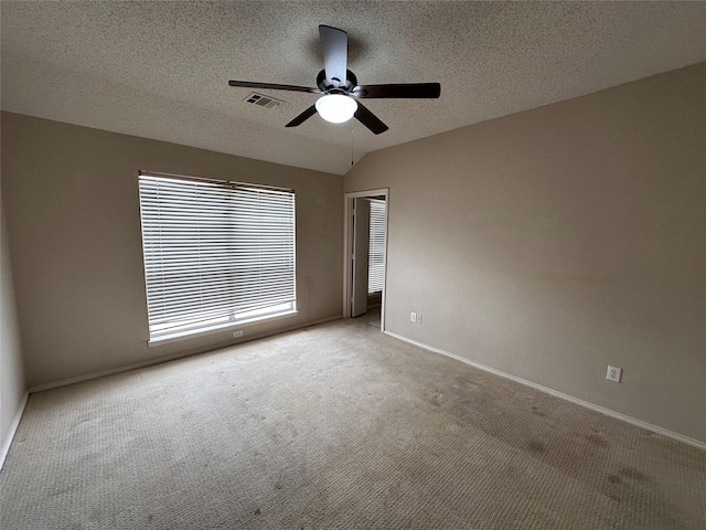 4102 Baccarat Dr, Garland, TX 75043 - empty room with a ceiling fan, carpet floors, baseboards, and a textured ceiling