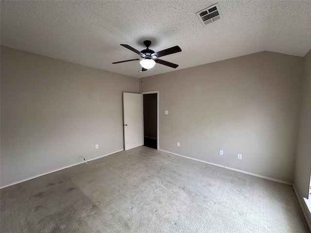 4102 Baccarat Dr, Garland, TX 75043 - carpeted empty room with a ceiling fan, baseboards, and a textured ceiling