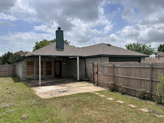 4102 Baccarat Dr, Garland, TX 75043 - back of house with a patio area, a chimney, brick siding, a shingled roof, and a gate