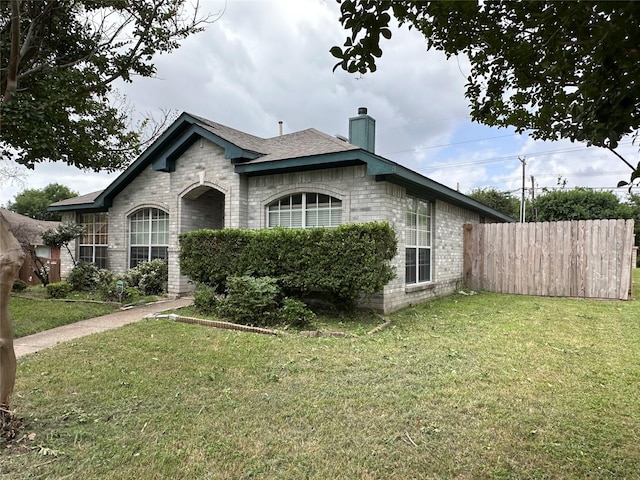 4102 Baccarat Dr, Garland, TX 75043 - view of front of home with brick siding, a chimney, and a shingled roof