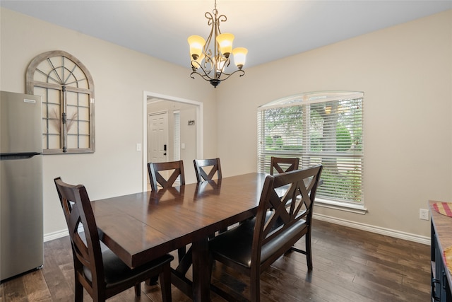 8208 Burleigh St, Frisco, TX 75035 - dining room with a chandelier, baseboards, and dark wood-type flooring
