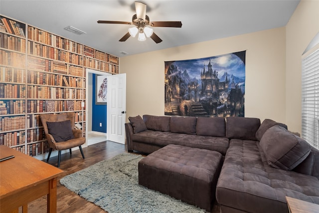 8208 Burleigh St, Frisco, TX 75035 - living area featuring ceiling fan, wood finished floors, and built in features