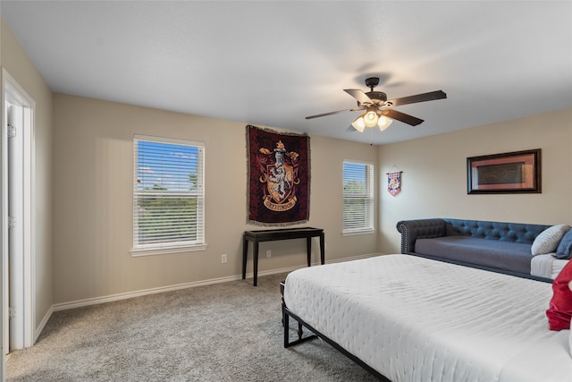 8208 Burleigh St, Frisco, TX 75035 - carpeted bedroom featuring multiple windows, baseboards, and ceiling fan
