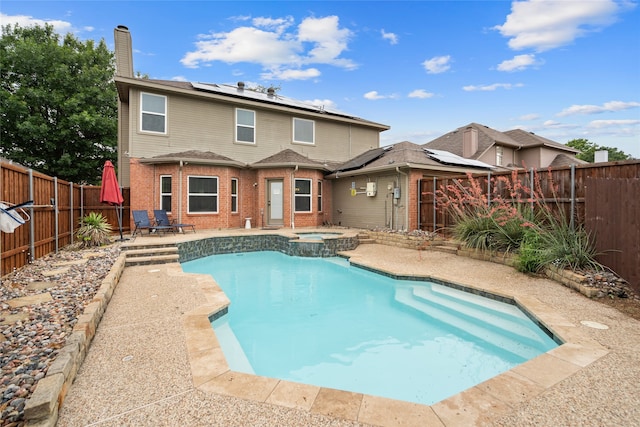 8208 Burleigh St, Frisco, TX 75035 - view of swimming pool with a fenced backyard, a patio area, and a pool with connected hot tub