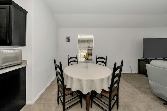 16608 Portage St, Justin, TX 76247 - dining room with baseboards and vaulted ceiling