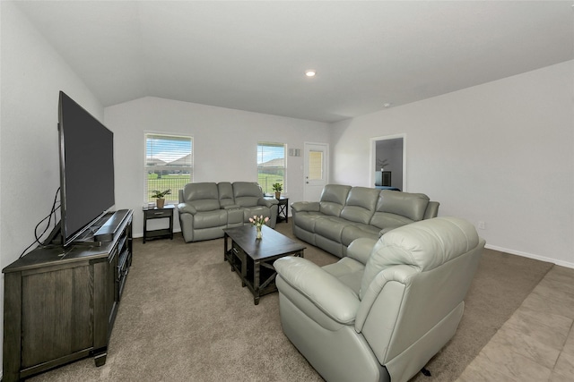 16608 Portage St, Justin, TX 76247 - living area featuring baseboards, vaulted ceiling, and light carpet