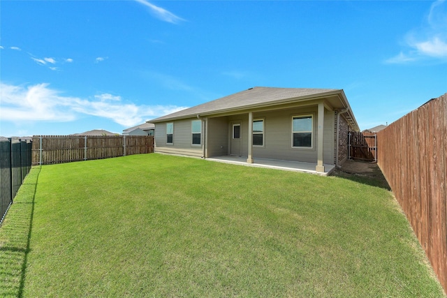 16608 Portage St, Justin, TX 76247 - back of property with a patio area