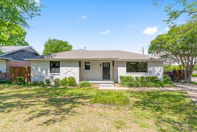 2305 Fenestra Dr, Dallas, TX 75228 - single story home with brick siding, a porch, and a shingled roof
