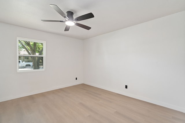 2305 Fenestra Dr, Dallas, TX 75228 - unfurnished room with light wood-style floors and a ceiling fan