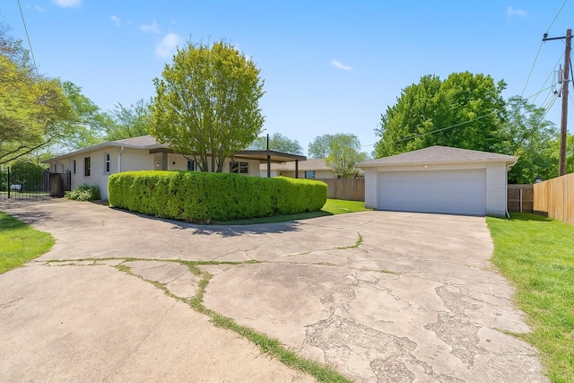 2305 Fenestra Dr, Dallas, TX 75228 - single story home featuring a garage, brick siding, and an outdoor structure