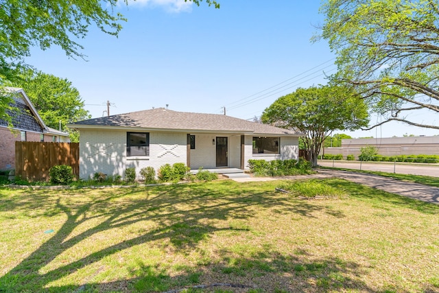 2305 Fenestra Dr, Dallas, TX 75228 - ranch-style home featuring brick siding and a shingled roof