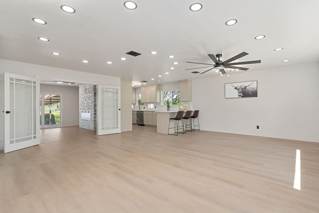 2305 Fenestra Dr, Dallas, TX 75228 - unfurnished living room featuring recessed lighting, light wood finished floors, french doors, and a ceiling fan