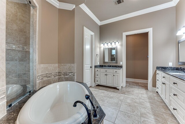 2412 Versailles Dr, Heath, TX 75032 - full bath with crown molding, a garden tub, and two vanities