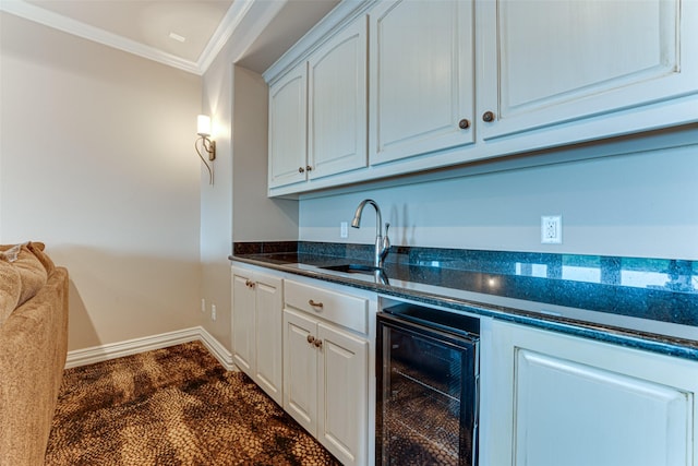 2412 Versailles Dr, Heath, TX 75032 - bar area with beverage cooler, crown molding, a sink, and baseboards