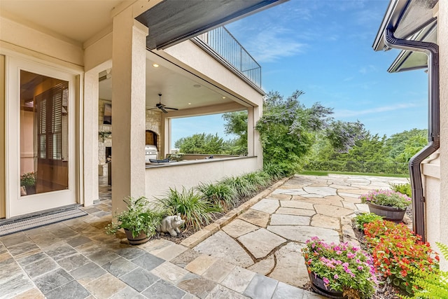2412 Versailles Dr, Heath, TX 75032 - view of patio / terrace featuring a ceiling fan, a balcony, and an outdoor kitchen