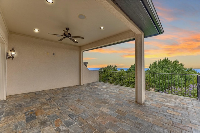 2412 Versailles Dr, Heath, TX 75032 - patio terrace at dusk featuring a ceiling fan and a patio