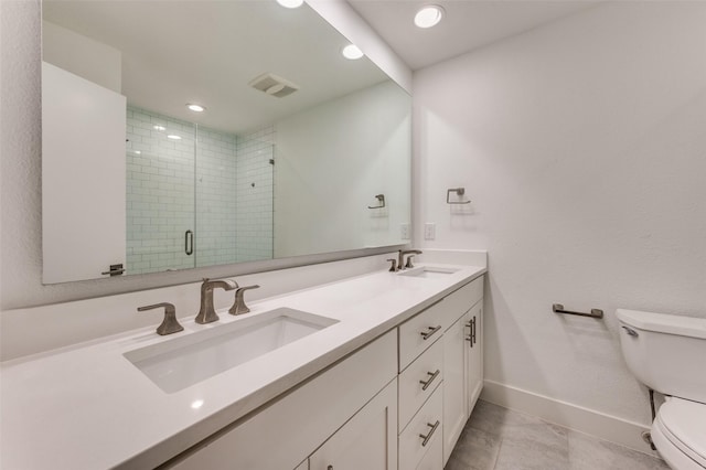 4047 Calculus Dr, Dallas, TX 75244 - full bath featuring toilet, double vanity, a stall shower, baseboards, and recessed lighting