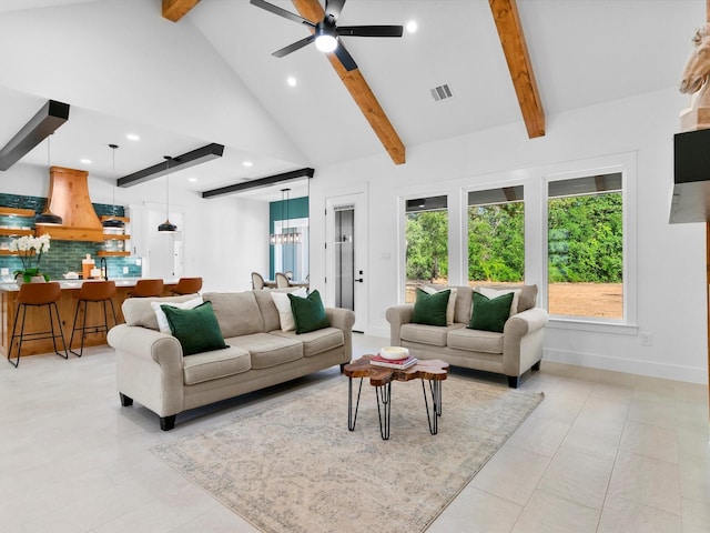 1705 J E, Woody, Springtown, TX 76082 - living area featuring beam ceiling, ceiling fan, recessed lighting, light tile patterned flooring, and baseboards
