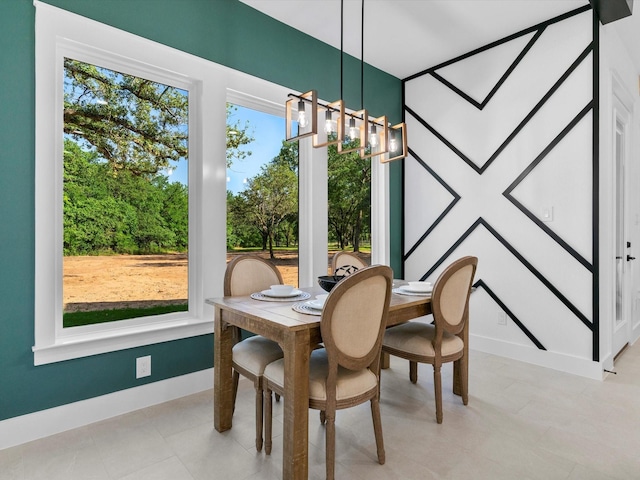 1705 J E, Woody, Springtown, TX 76082 - dining room featuring baseboards and a chandelier
