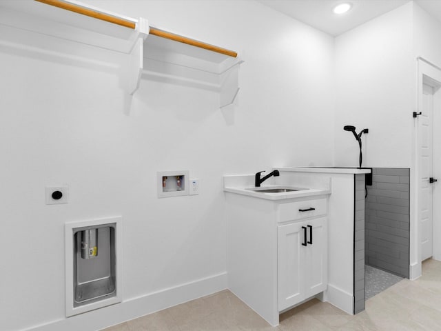 1705 J E, Woody, Springtown, TX 76082 - laundry area with hookup for a washing machine, a sink, electric dryer hookup, recessed lighting, and baseboards