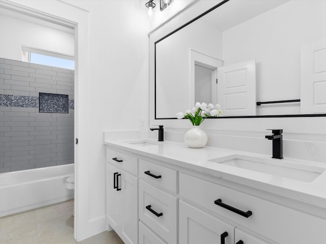 1705 J E, Woody, Springtown, TX 76082 - bathroom featuring double vanity, toilet, tile patterned flooring, and tub / shower combination