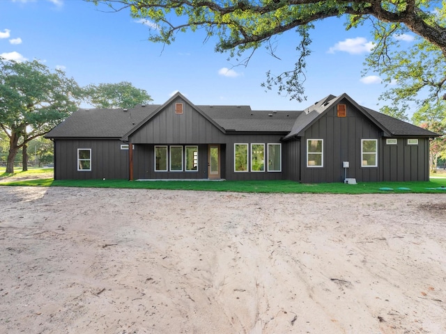 1705 J E, Woody, Springtown, TX 76082 - back of property featuring board and batten siding and a shingled roof