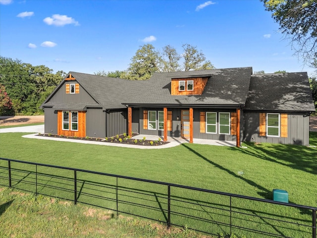 1705 J E, Woody, Springtown, TX 76082 - view of front of property featuring a porch, board and batten siding, and a shingled roof