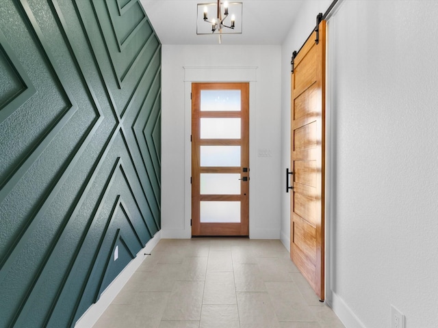 1705 J E, Woody, Springtown, TX 76082 - entryway with baseboards, a barn door, and a chandelier