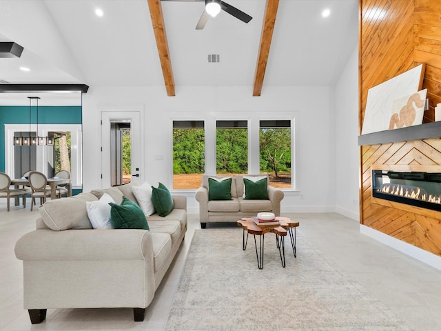 1705 J E, Woody, Springtown, TX 76082 - living room featuring plenty of natural light, recessed lighting, a ceiling fan, a glass covered fireplace, and a chandelier