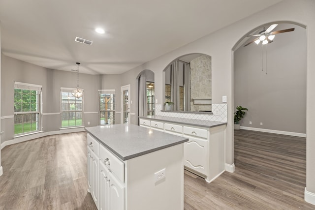1317 Ocotillo, Fort Worth, TX 76177 - kitchen with a center island, white cabinets, light wood-style floors, and ceiling fan