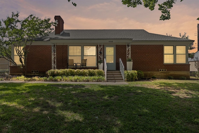 3516 Rogers Ave, Fort Worth, TX 76109 - view of front facade with brick siding, a lawn, a chimney, and a shingled roof