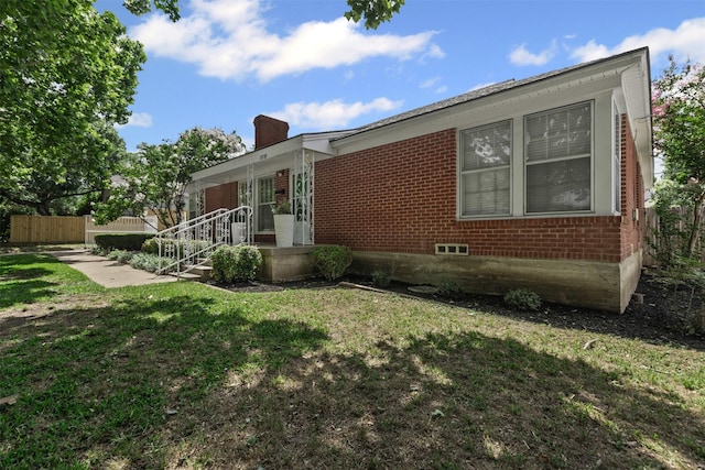3516 Rogers Ave, Fort Worth, TX 76109 - view of home's exterior with brick siding and a chimney