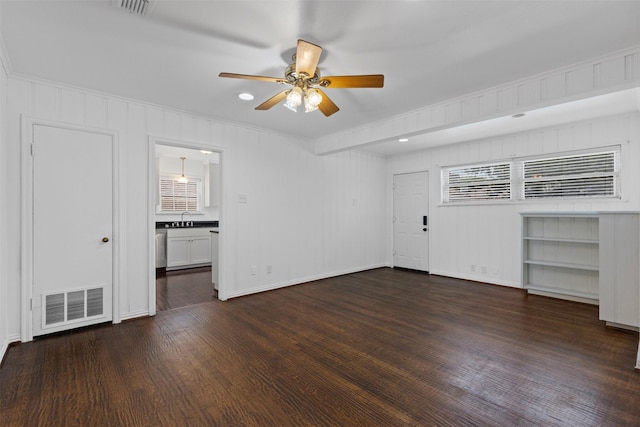 3516 Rogers Ave, Fort Worth, TX 76109 - unfurnished living room featuring a ceiling fan, dark wood finished floors, ornamental molding, and baseboards