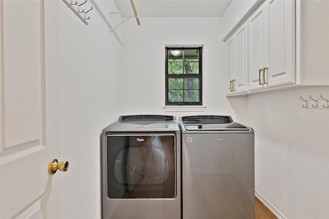 413 Timberlake Dr, Azle, TX 76020 - washroom featuring cabinet space and washing machine and clothes dryer